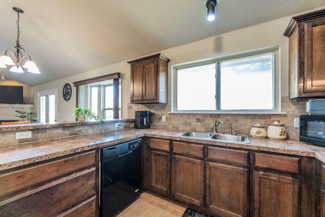 kitchen featuring sink, a wealth of natural light, a notable chandelier, and black appliances