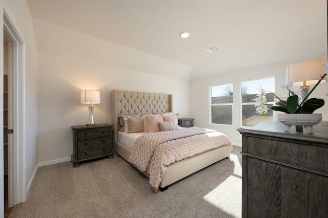 bedroom with light carpet, recessed lighting, visible vents, and baseboards