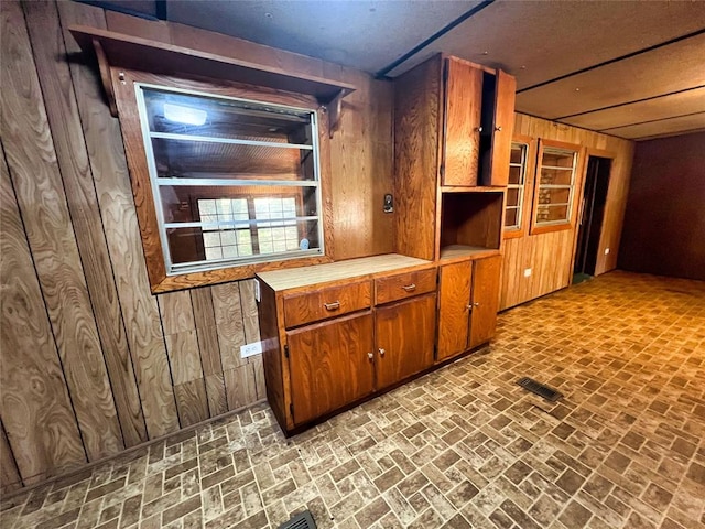 kitchen with wood walls