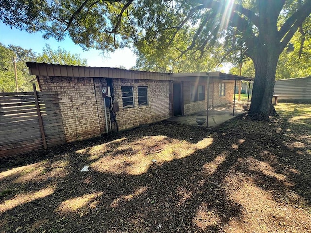 rear view of house with a patio area