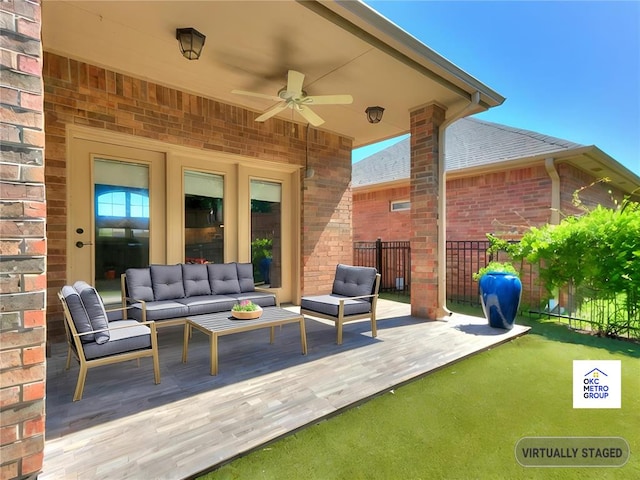 view of patio with ceiling fan and outdoor lounge area