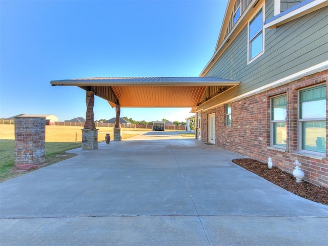 view of patio / terrace featuring a carport