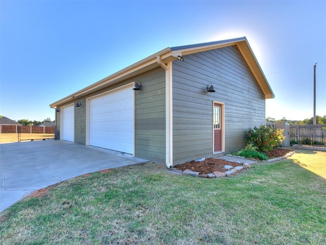 garage with a lawn