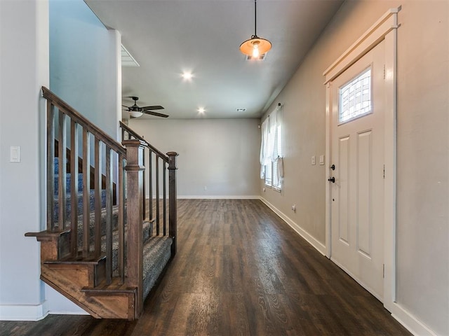 foyer featuring ceiling fan and dark hardwood / wood-style floors