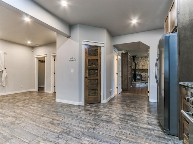 interior space with dark hardwood / wood-style flooring