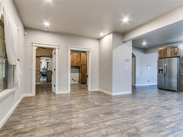 spare room featuring light wood-type flooring