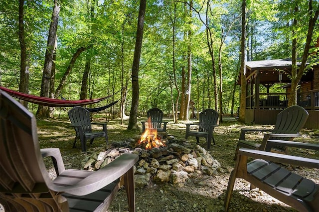 exterior space featuring an outdoor fire pit