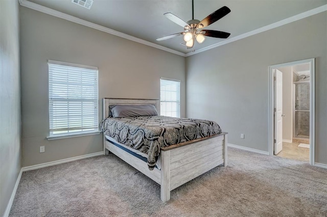 carpeted bedroom with connected bathroom, ceiling fan, and ornamental molding