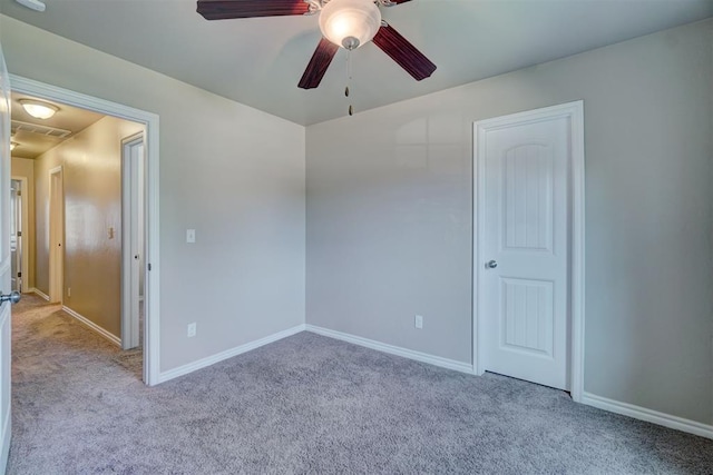 empty room with light carpet and ceiling fan