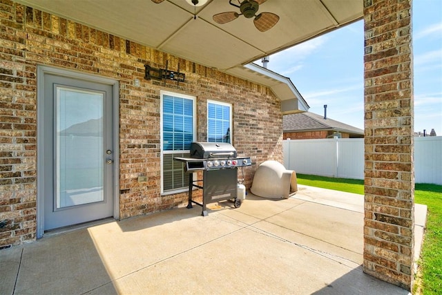 view of patio / terrace with a grill and ceiling fan