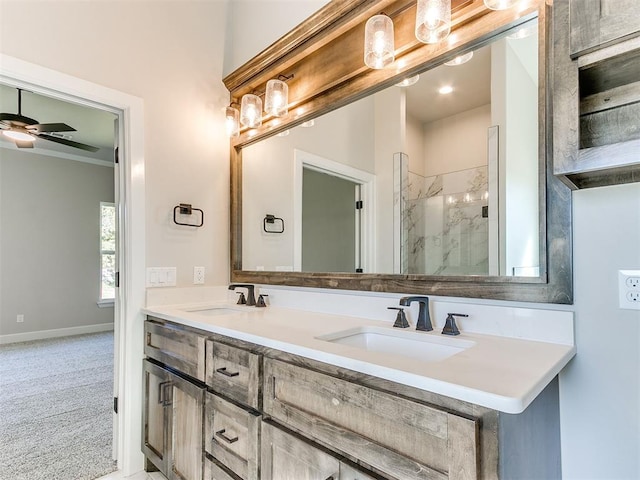 bathroom featuring walk in shower, vanity, and ceiling fan