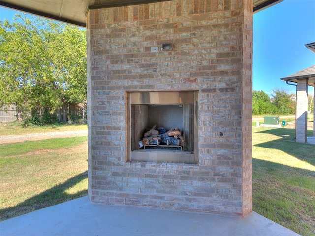 exterior space featuring exterior fireplace