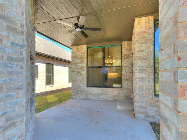 view of patio featuring ceiling fan