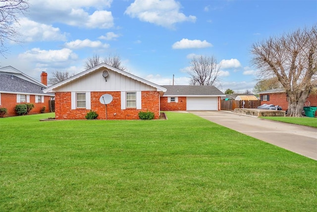 ranch-style home featuring a garage and a front lawn