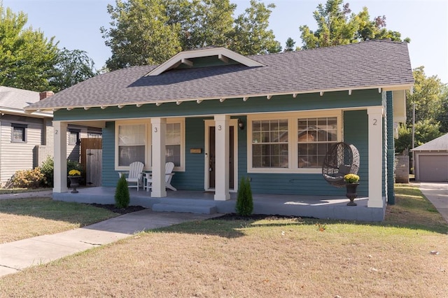 view of front of home featuring a porch and a front yard