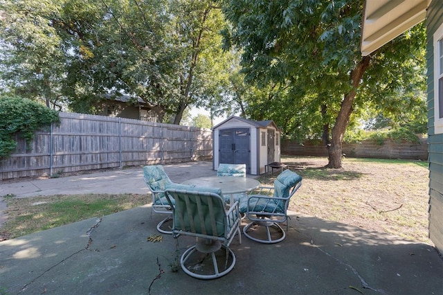 view of patio / terrace with a storage shed