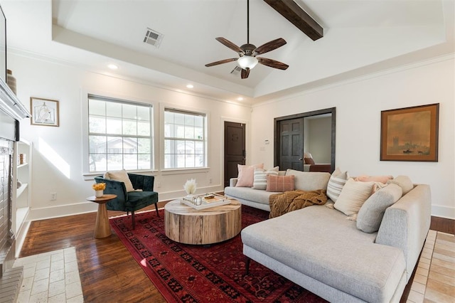 living room featuring dark hardwood / wood-style flooring, lofted ceiling with beams, and ceiling fan