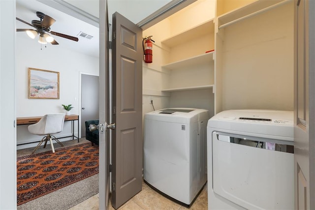 washroom featuring separate washer and dryer and ceiling fan