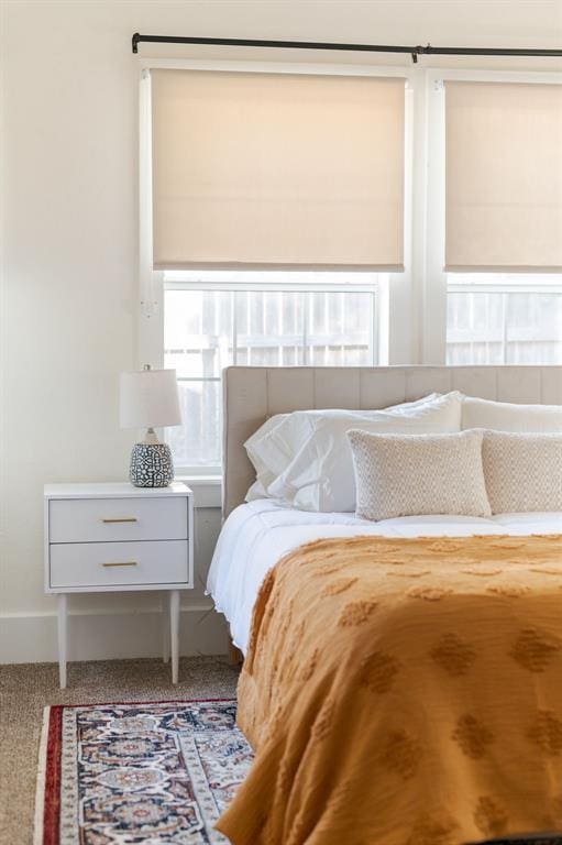 bedroom featuring carpet