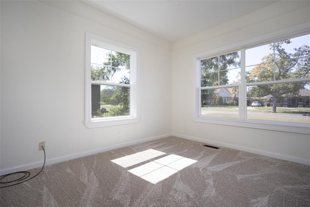 view of carpeted spare room