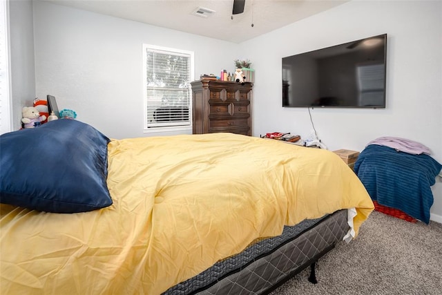 carpeted bedroom with ceiling fan