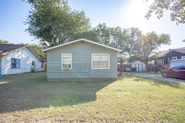 view of property exterior with a lawn