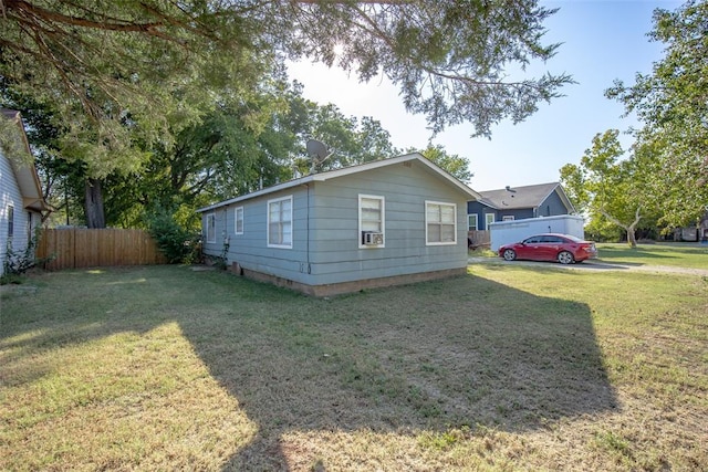 view of home's exterior featuring a lawn