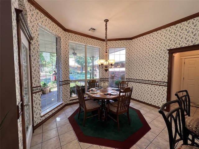 dining area featuring wallpapered walls, baseboards, visible vents, ornamental molding, and a chandelier