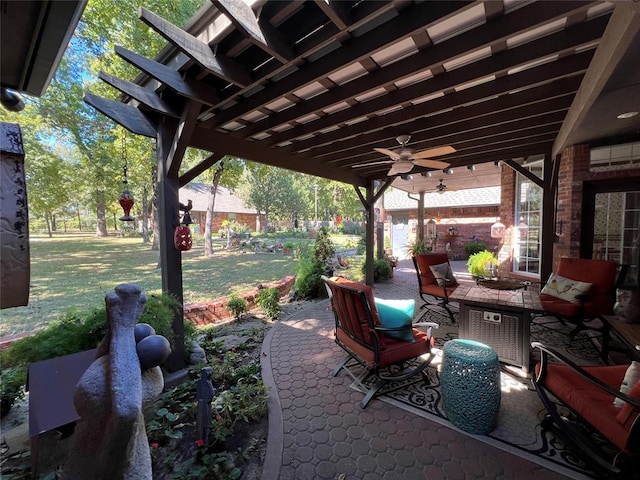 view of patio with ceiling fan and a pergola