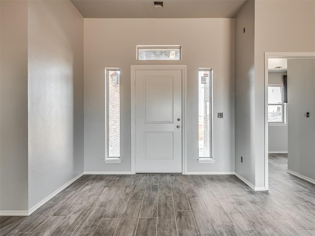 entrance foyer with light hardwood / wood-style floors