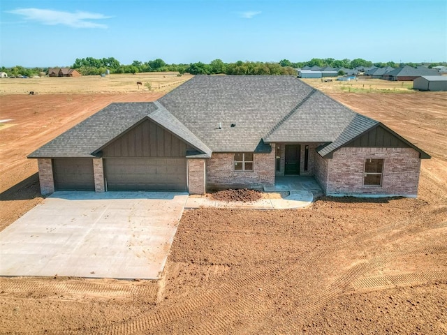 view of front of property featuring a garage