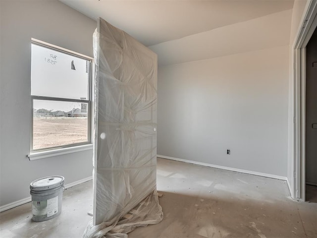 unfurnished bedroom with baseboards