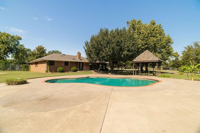 view of swimming pool featuring a gazebo and a patio