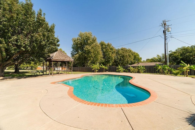 view of pool with a gazebo and a patio area