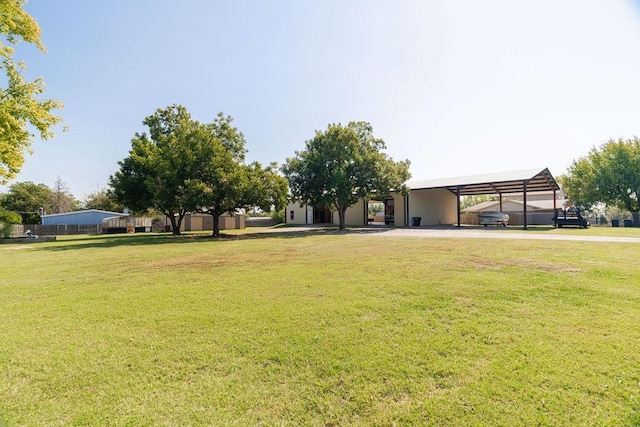 view of yard featuring a carport