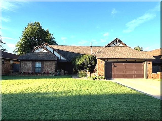 ranch-style house featuring a front yard and a garage