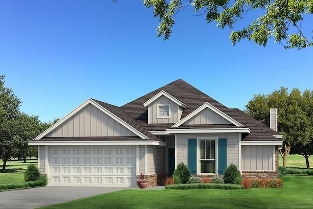 craftsman inspired home with a garage and a front lawn