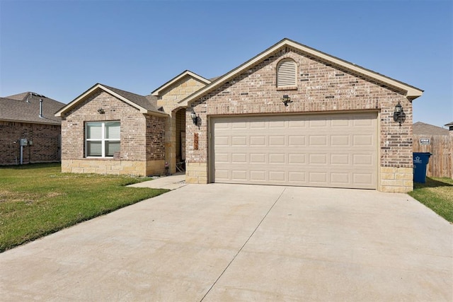 view of front of home with a garage and a front yard