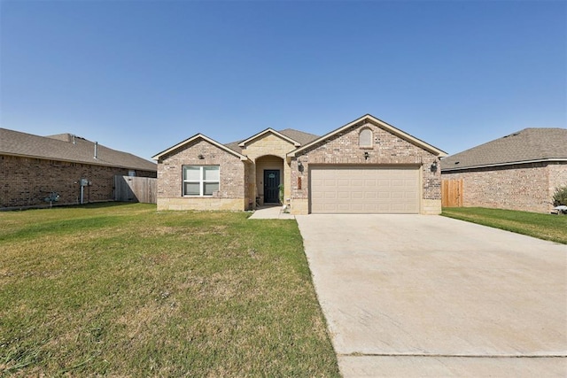 ranch-style home featuring a garage and a front lawn