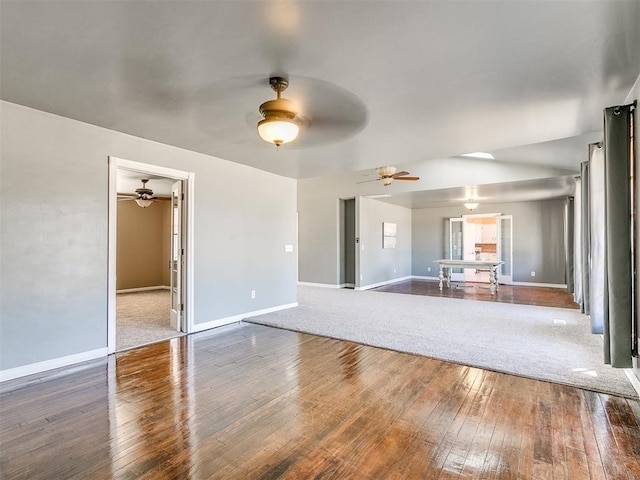 unfurnished living room featuring wood-type flooring