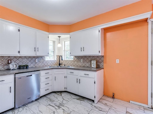 kitchen with dishwasher, decorative backsplash, sink, and hanging light fixtures