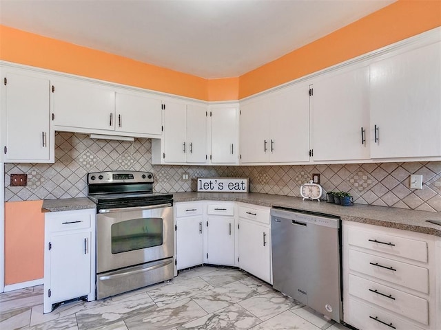 kitchen with decorative backsplash, white cabinetry, and stainless steel appliances