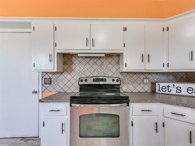 kitchen with white cabinets, stainless steel electric range oven, and backsplash