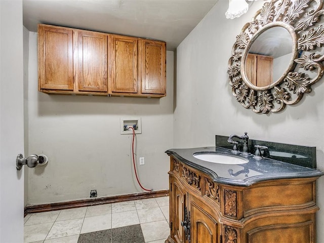 bathroom featuring tile patterned floors and vanity