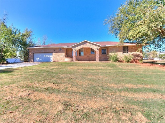 ranch-style house with a front yard and a garage