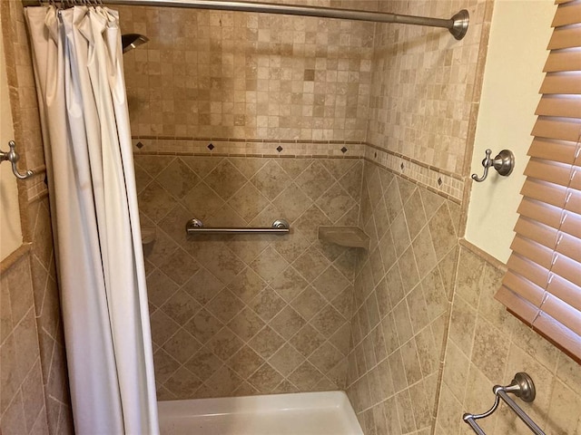 bathroom featuring walk in shower