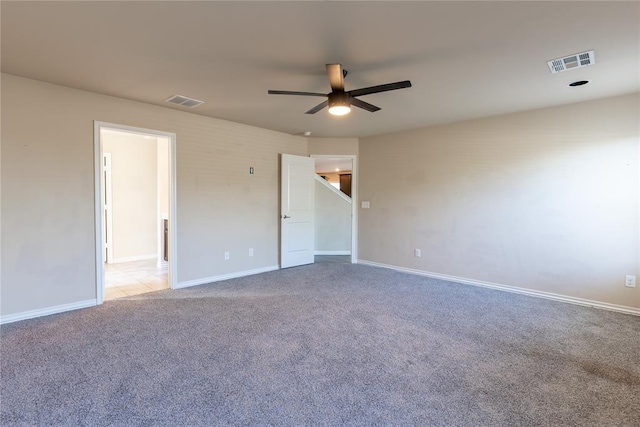 unfurnished bedroom featuring ceiling fan and light colored carpet