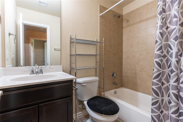 full bathroom with vanity, toilet, and shower / bath combo with shower curtain