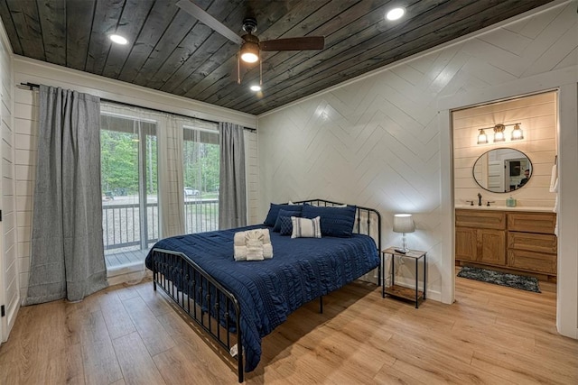 bedroom featuring access to outside, ceiling fan, wooden ceiling, connected bathroom, and light hardwood / wood-style floors