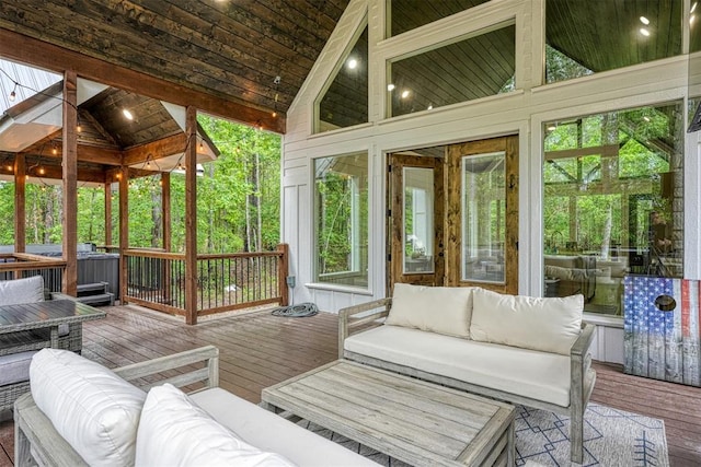 sunroom / solarium with lofted ceiling